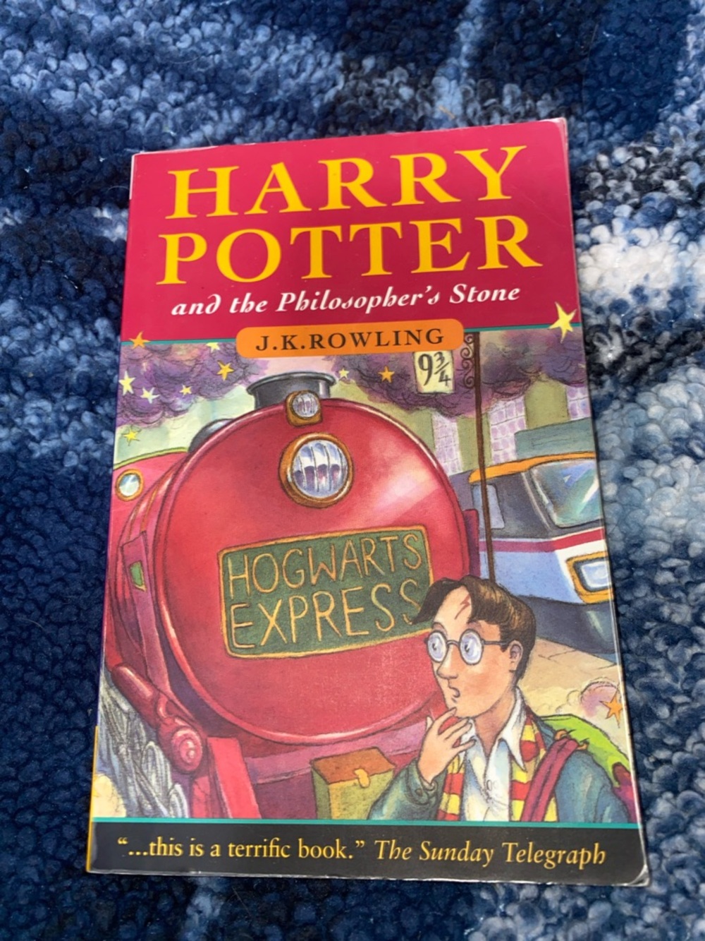 Harry Potter and the Philosopher's Stone — J.K. Rowling (Red Cover)